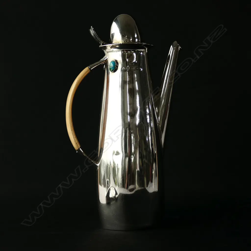 A rare Archibald Knox three-piece Cymric silver coffee service for Liberty & Co. Image 1++