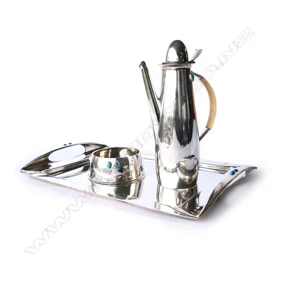 A rare Archibald Knox three-piece Cymric silver coffee service for Liberty & Co.