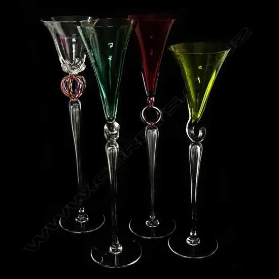 A harlequin set of four Val St. Lambert long stemmed wine glasses