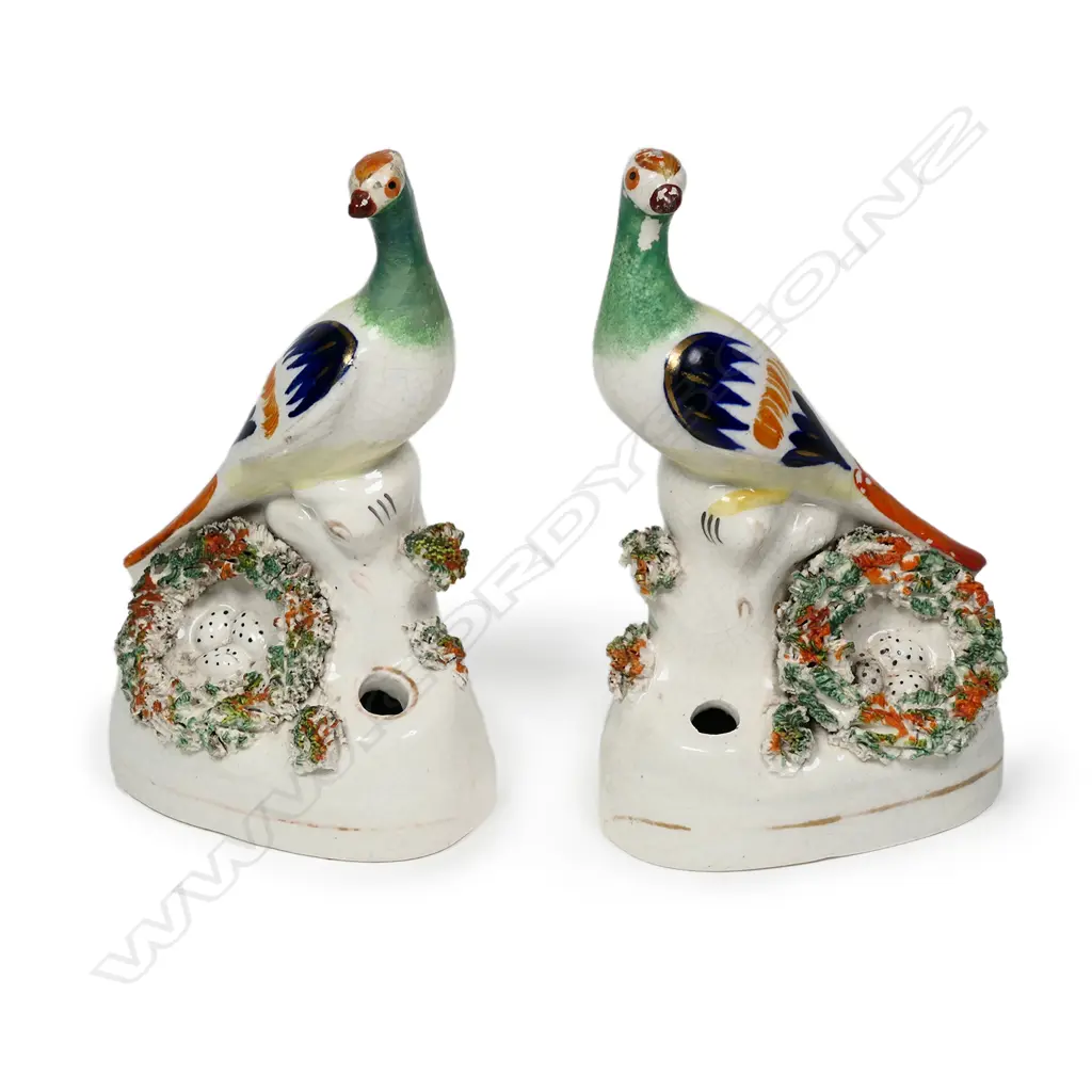 A pair of uncommon Victorian Staffordshire bird pen stands Image 1++
