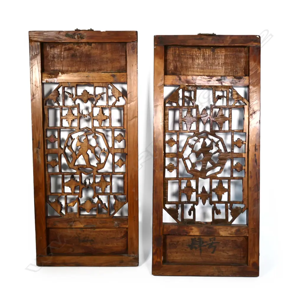 A pair of Chinese gilded and lacquered panels Image 1++