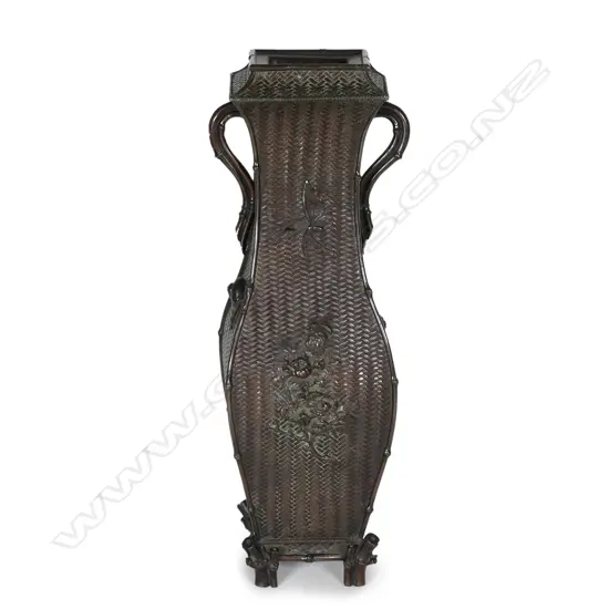 A Japanese Meiji period vase modelled as an ikebana basket
