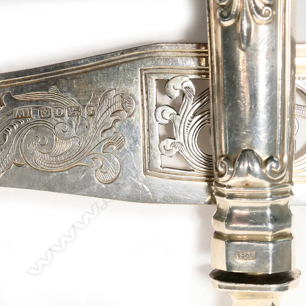 A pair of Victorian Queen’s pattern silver fish servers Image 1++