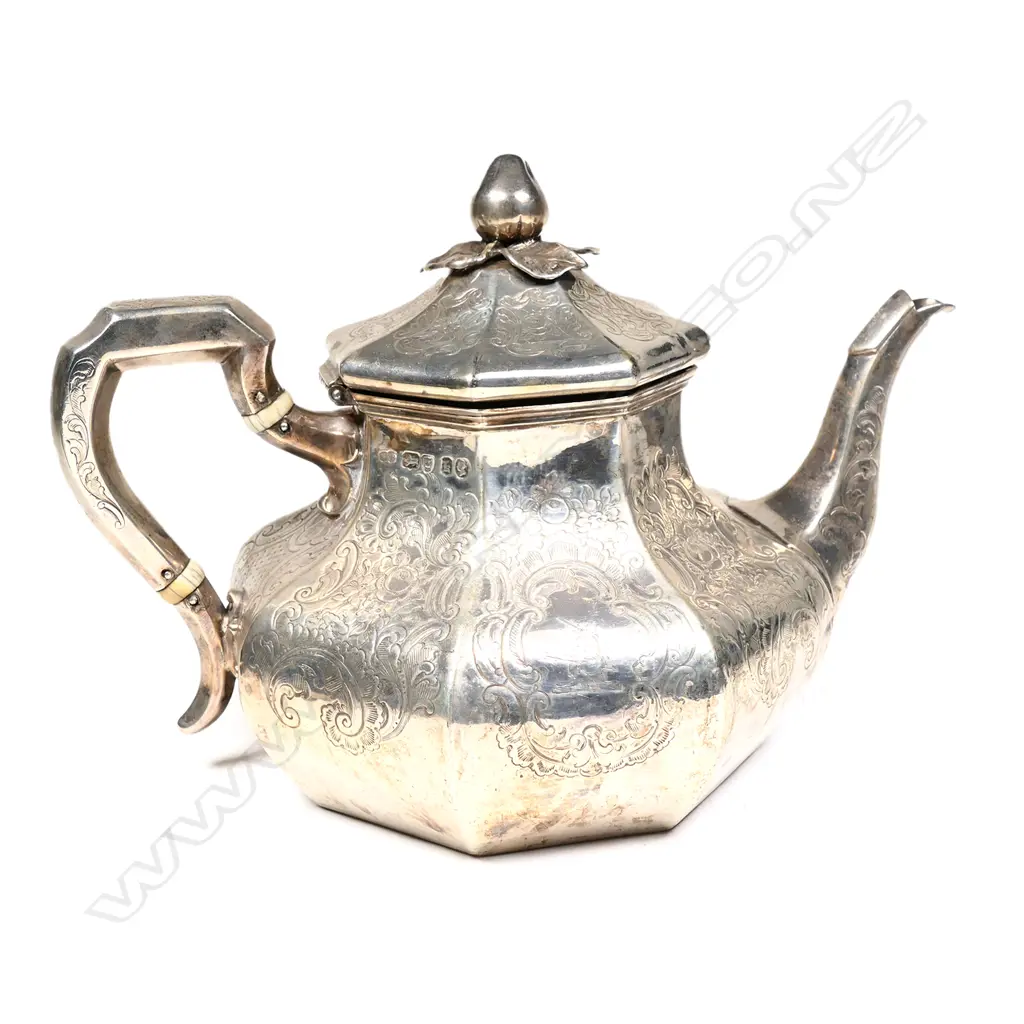 A Victorian silver teapot Image 1++