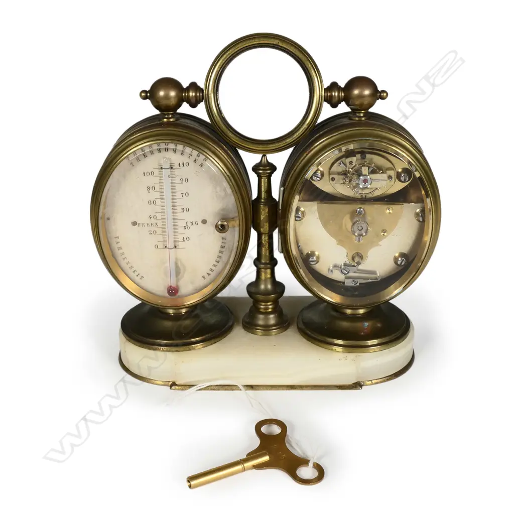 A combination desk top clock-barometer Image 1++
