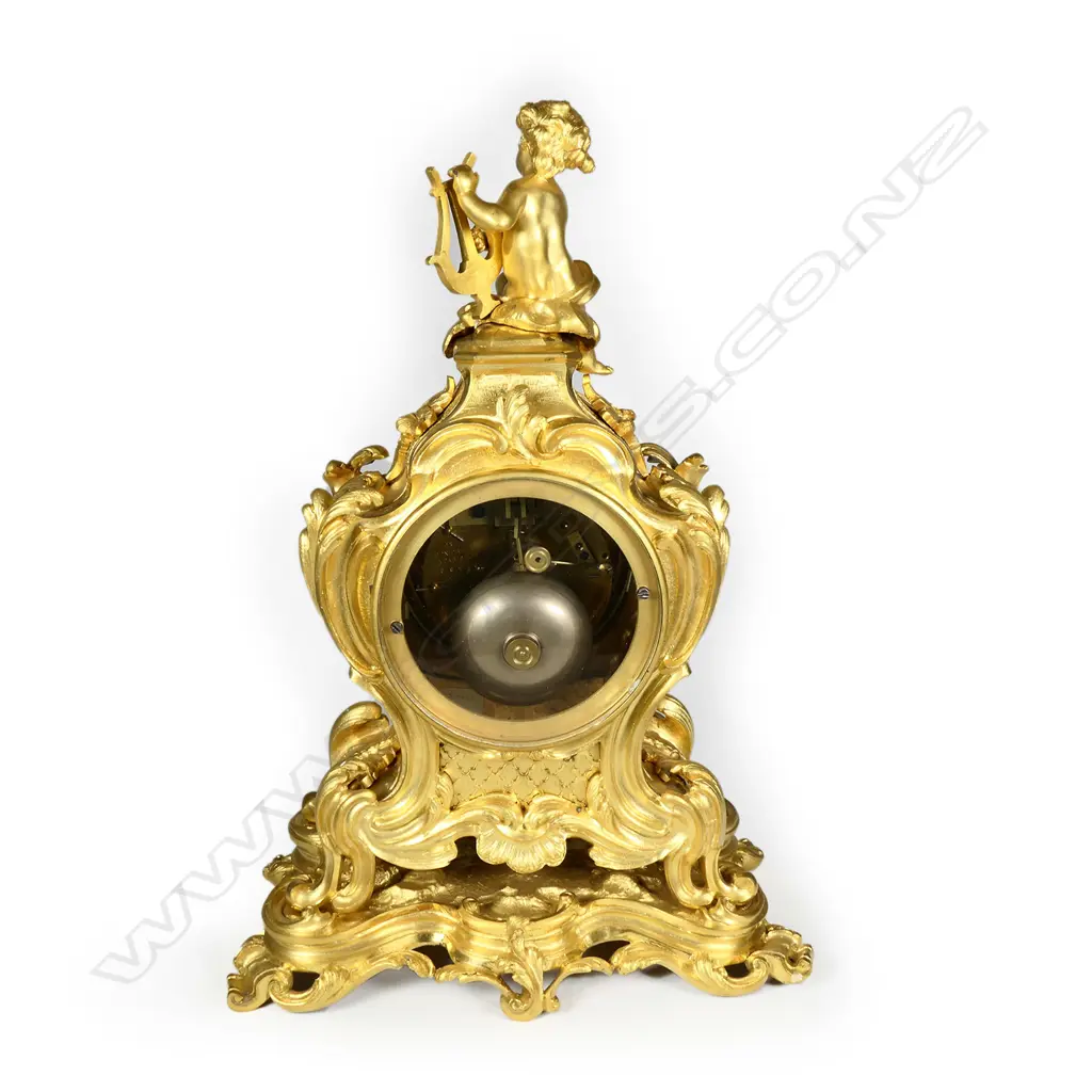 A 19thC French Rococo ormolu mantel clock Image 1++