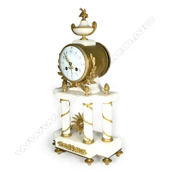 A 19thC French marble and gilt mantel clock