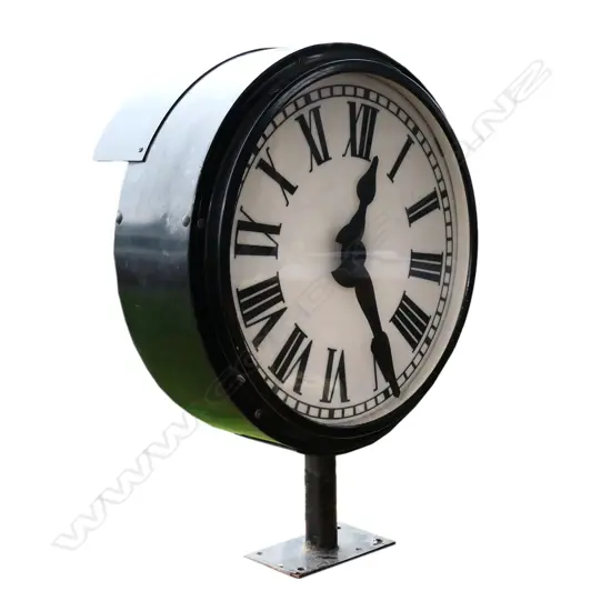 A large vintage double sided station clock