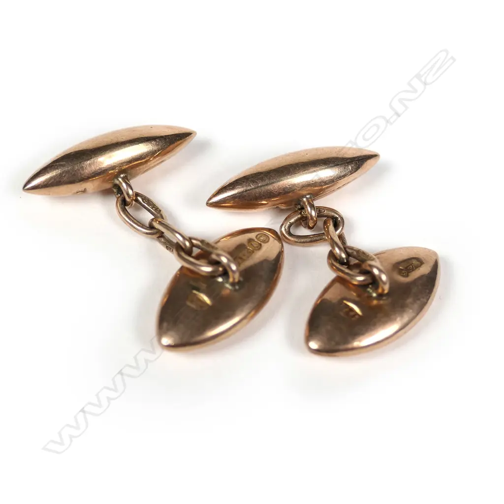 A pair of 9ct rose gold vintage cufflinks, plain lozenge and oval panel forms. 6gm. Image 1++