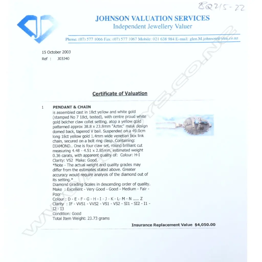 A heavy 18ct yellow gold and diamond set African mask pendant Image 1++