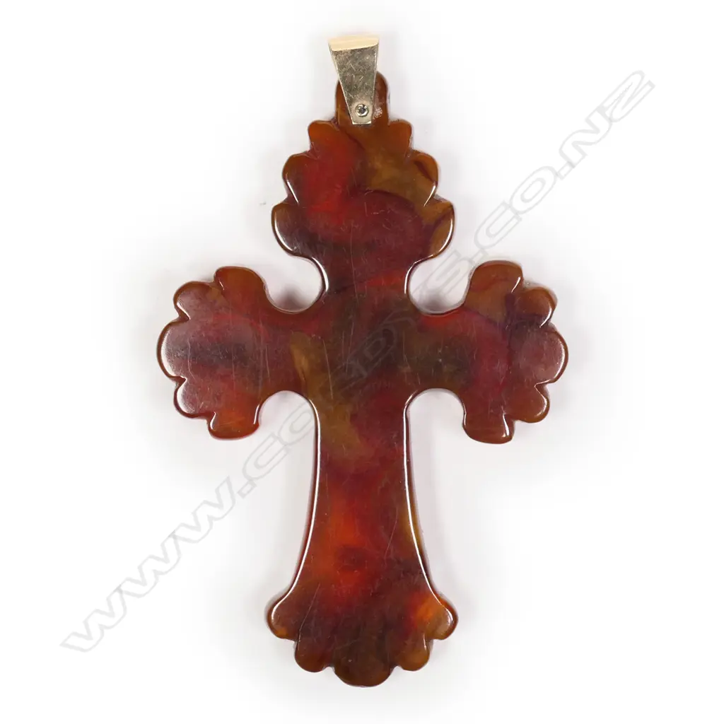 A c1900 carved amber cross Image 1++