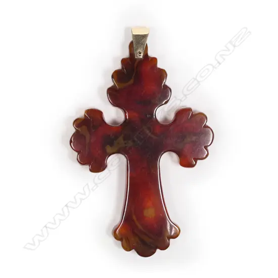 A c1900 carved amber cross