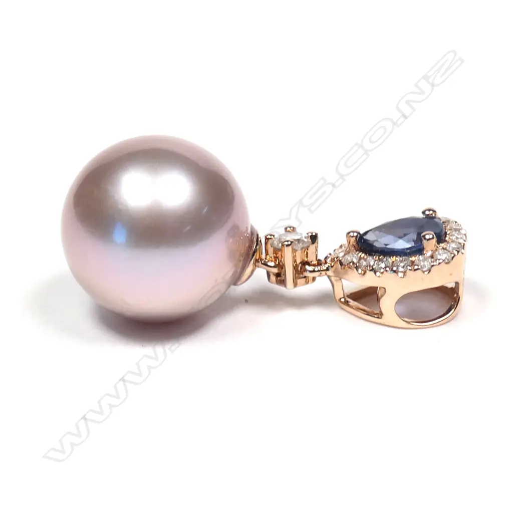 A 14ct rose gold sapphire diamond and pearl pendant Image 1++