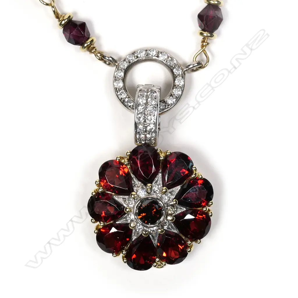 An 18ct yellow gold garnet and diamond handmade necklace Image 1++