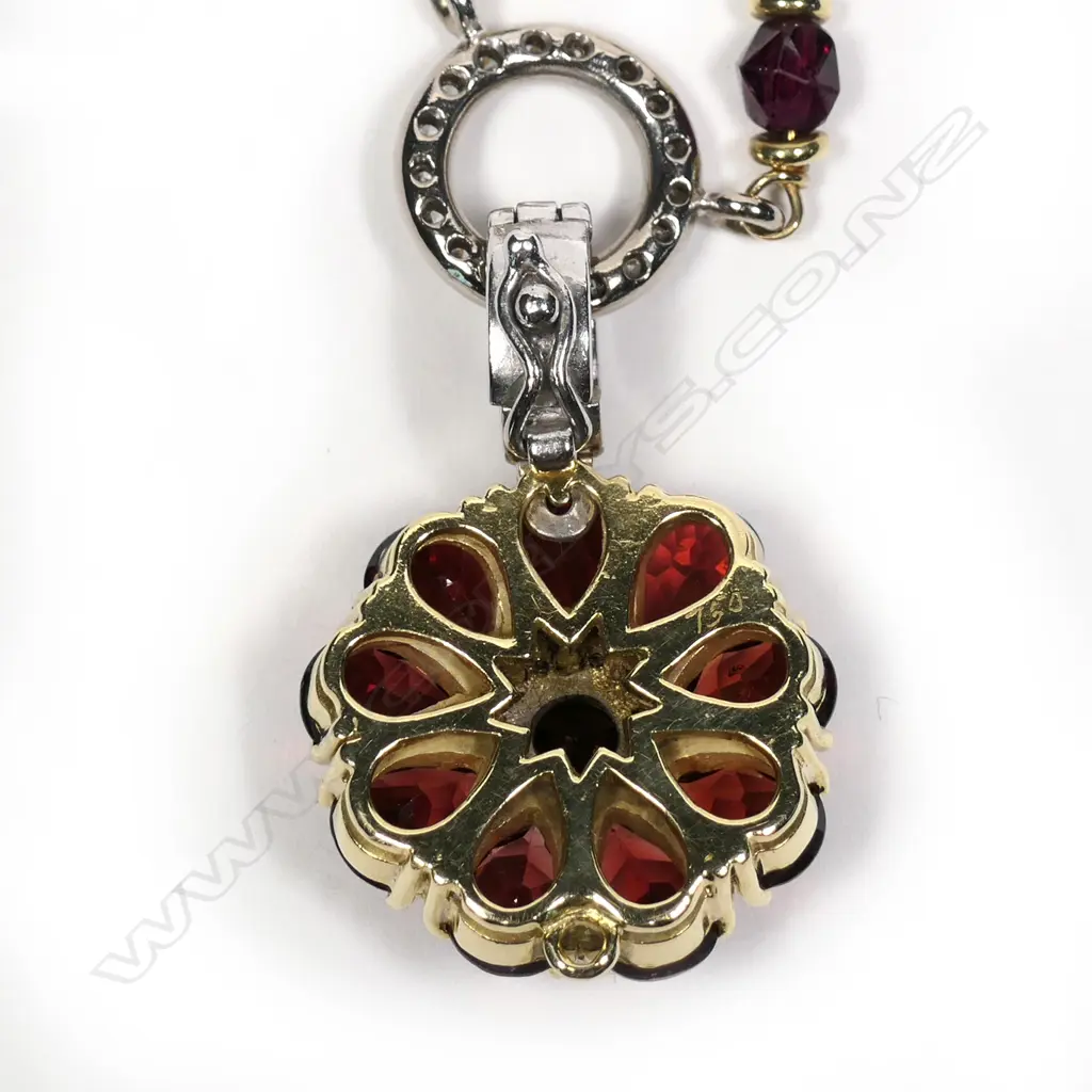 An 18ct yellow gold garnet and diamond handmade necklace Image 1++