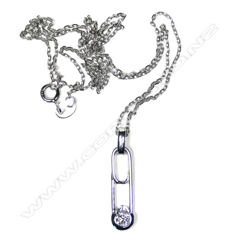 An 18ct and diamond pendant Image 1++