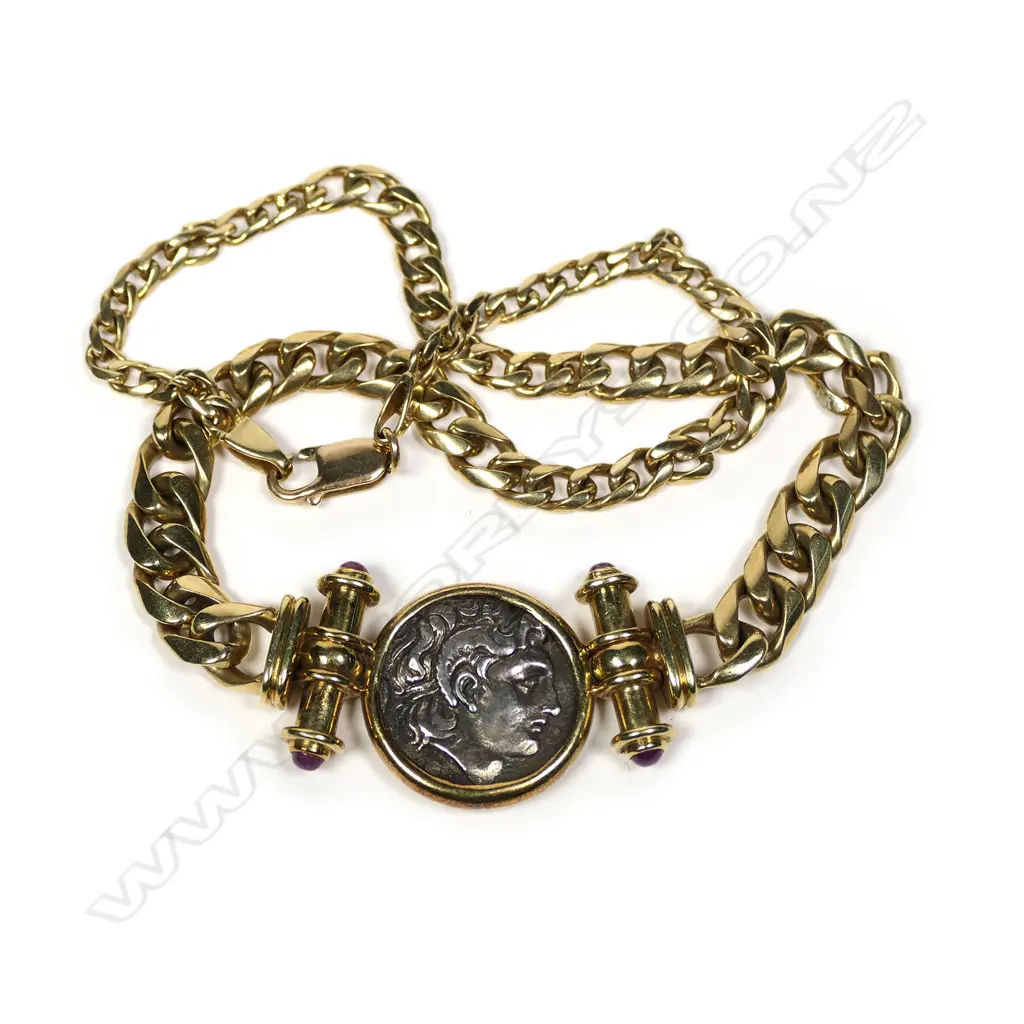 An 8ct gold neck chain set with Roman type coin Image 1++