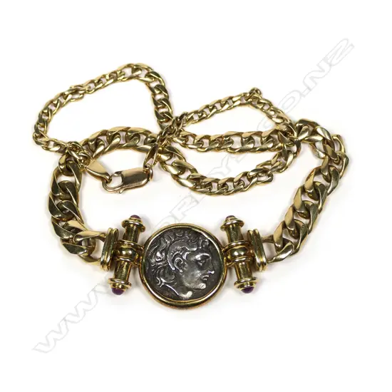 An 8ct gold neck chain set with Roman type coin