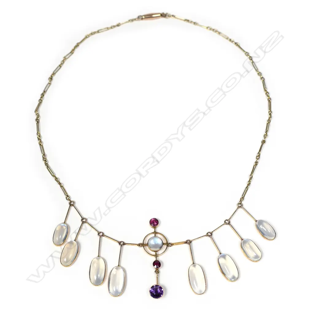 A stylish early 20thC 9ct yellow gold moonstone and gemstone necklace Image 1++