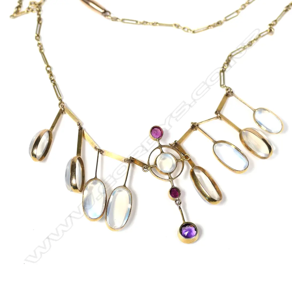 A stylish early 20thC 9ct yellow gold moonstone and gemstone necklace Image 1++
