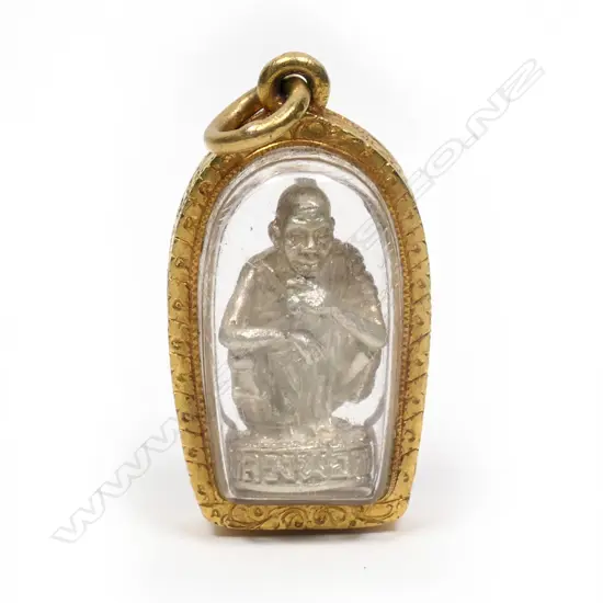 A 22ct gold framed encased buddha pendant