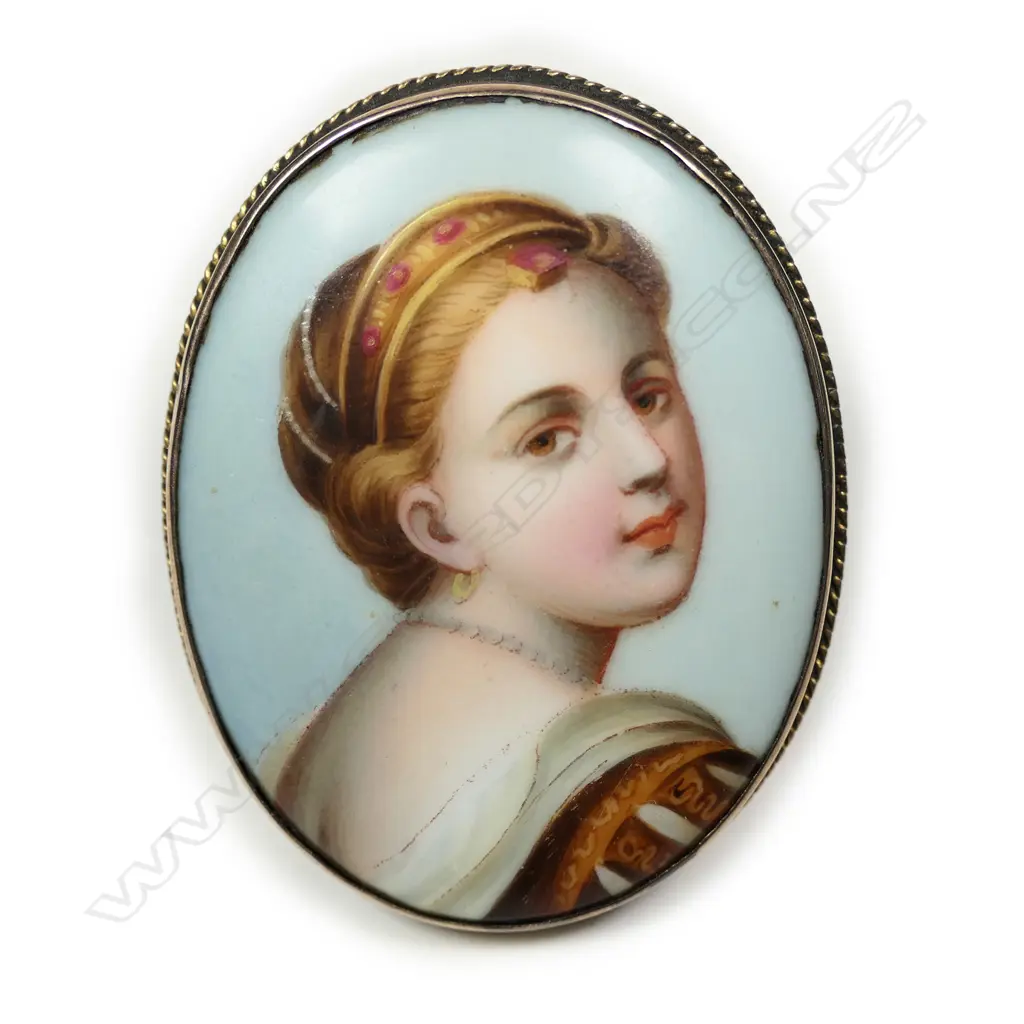 A c1900 9ct rose gold mounted finely painted portrait brooch Image 1++