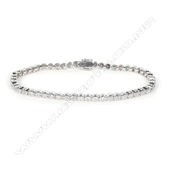 A 9ct white gold and diamond tennis bracelet