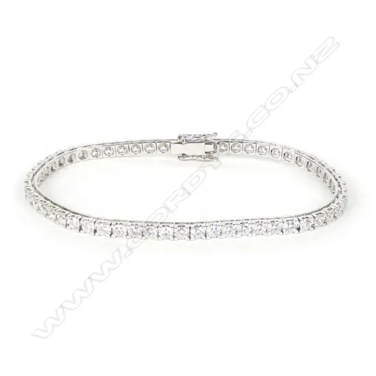 An 18ct white gold and diamond tennis bracelet