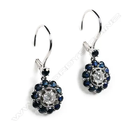 A pair of 14ct white gold sapphire and diamond drop earrings