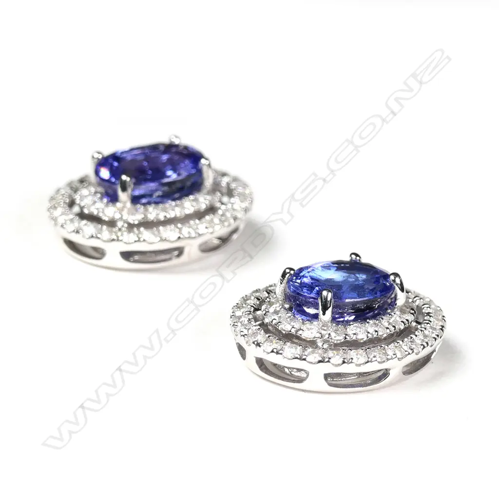 A pair of 14ct white gold tanzanite and diamond double halo stud earrings Image 1++