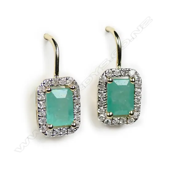 A pair of 14ct yellow gold Columbian emerald and diamond earrings