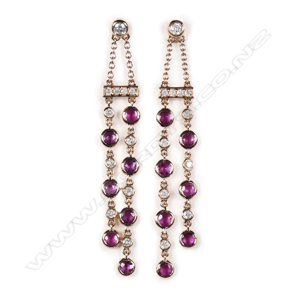 A pair of 14ct rose gold diamond and ruby drop chain earrings Image 1++