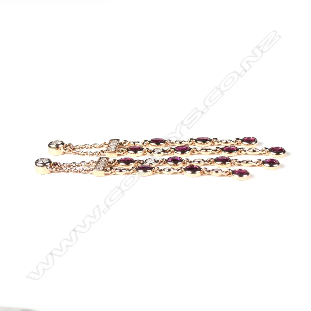 A pair of 14ct rose gold diamond and ruby drop chain earrings Image 1++
