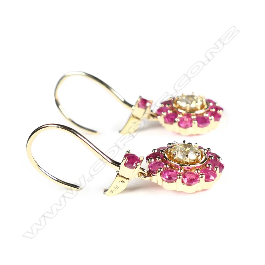 A pair of 14ct yellow gold diamond and ruby earrings Image 1++
