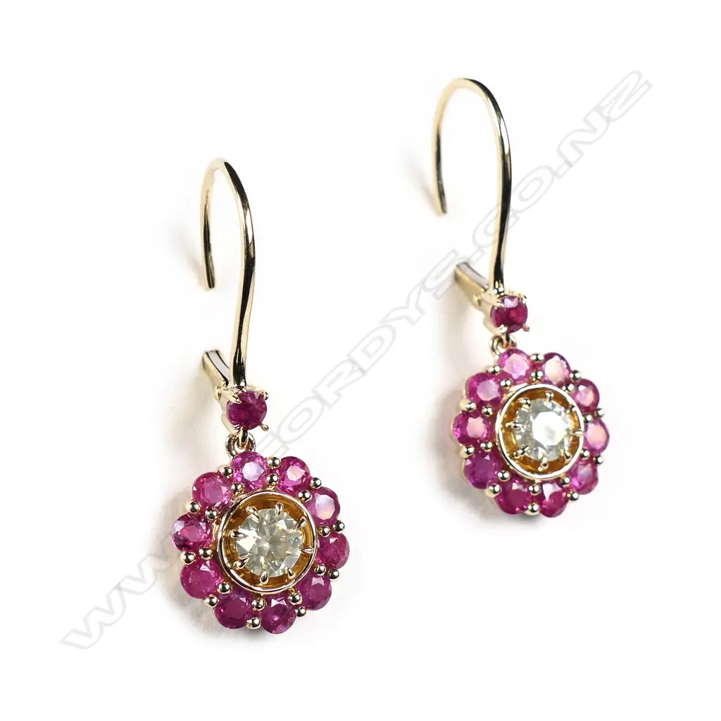 A pair of 14ct yellow gold diamond and ruby earrings Image 1++