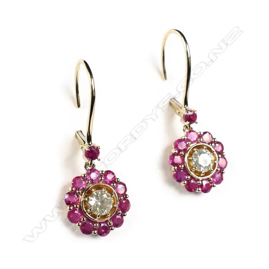A pair of 14ct yellow gold diamond and ruby earrings