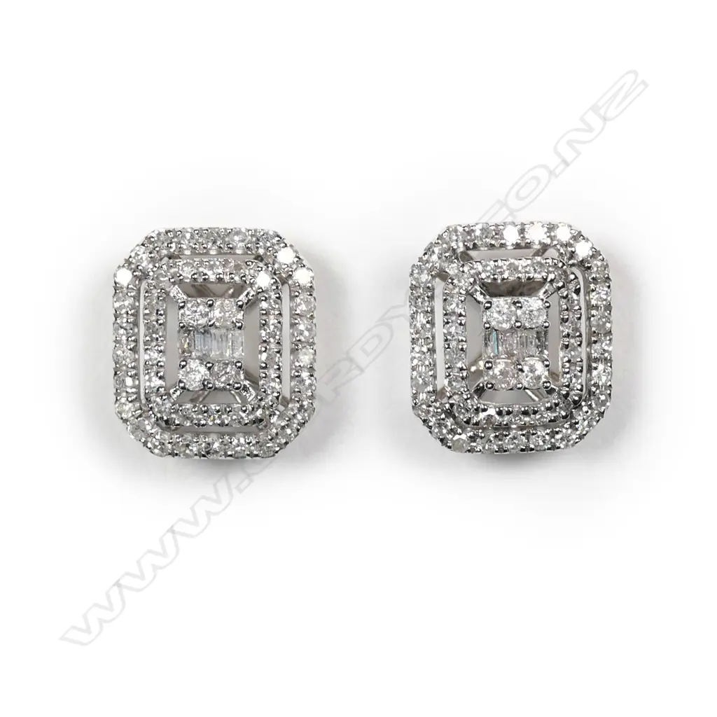 A pair of 18ct white gold and diamond earrings Image 1++
