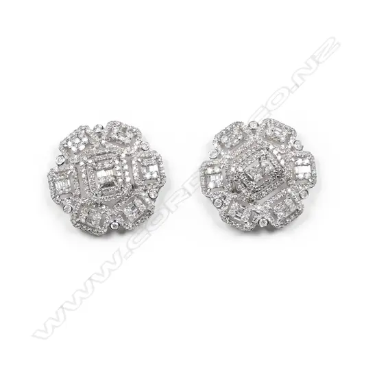A pair of 18ct white gold and diamond earrings