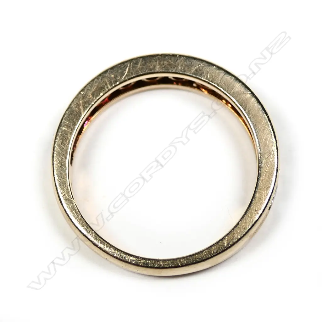 A 18ct gold 12 stone diamond ring, channel set, TDW. 1.95cts. Valuation available. Image 1++