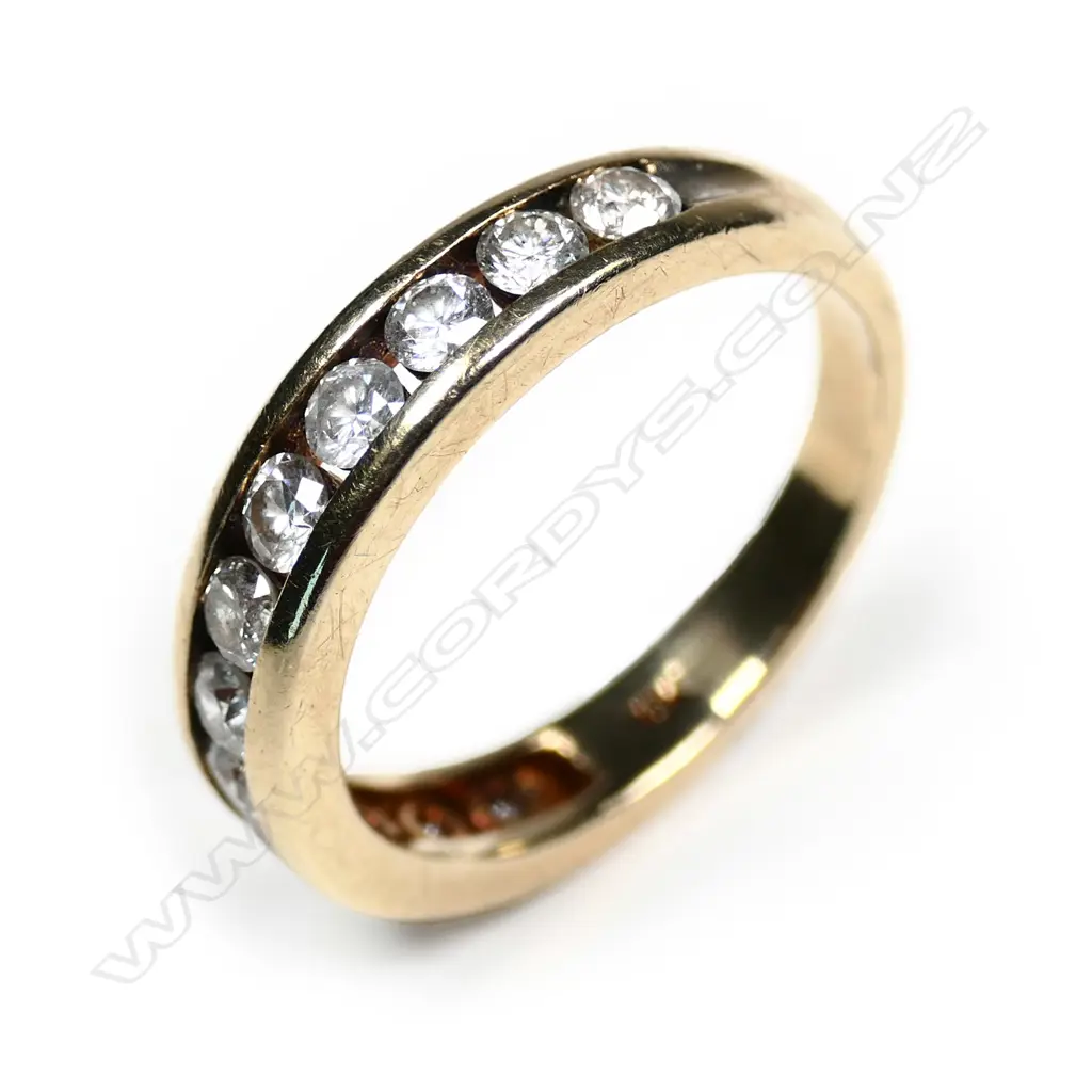 A 18ct gold 12 stone diamond ring, channel set, TDW. 1.95cts. Valuation available. Image 1++