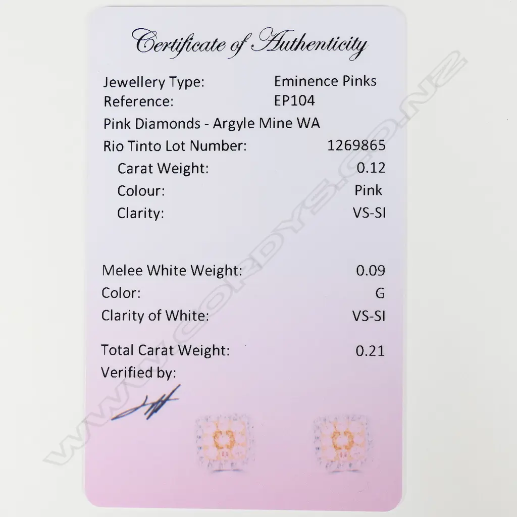 A pair of 14ct rose gold diamond stud earrings Image 1++