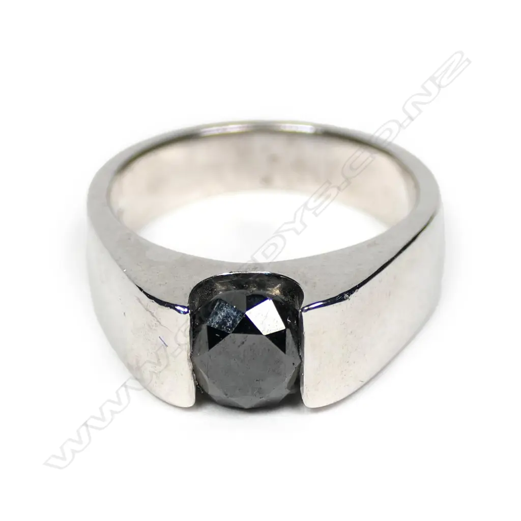 An 18ct white gold black diamond solitaire ring Image 1++