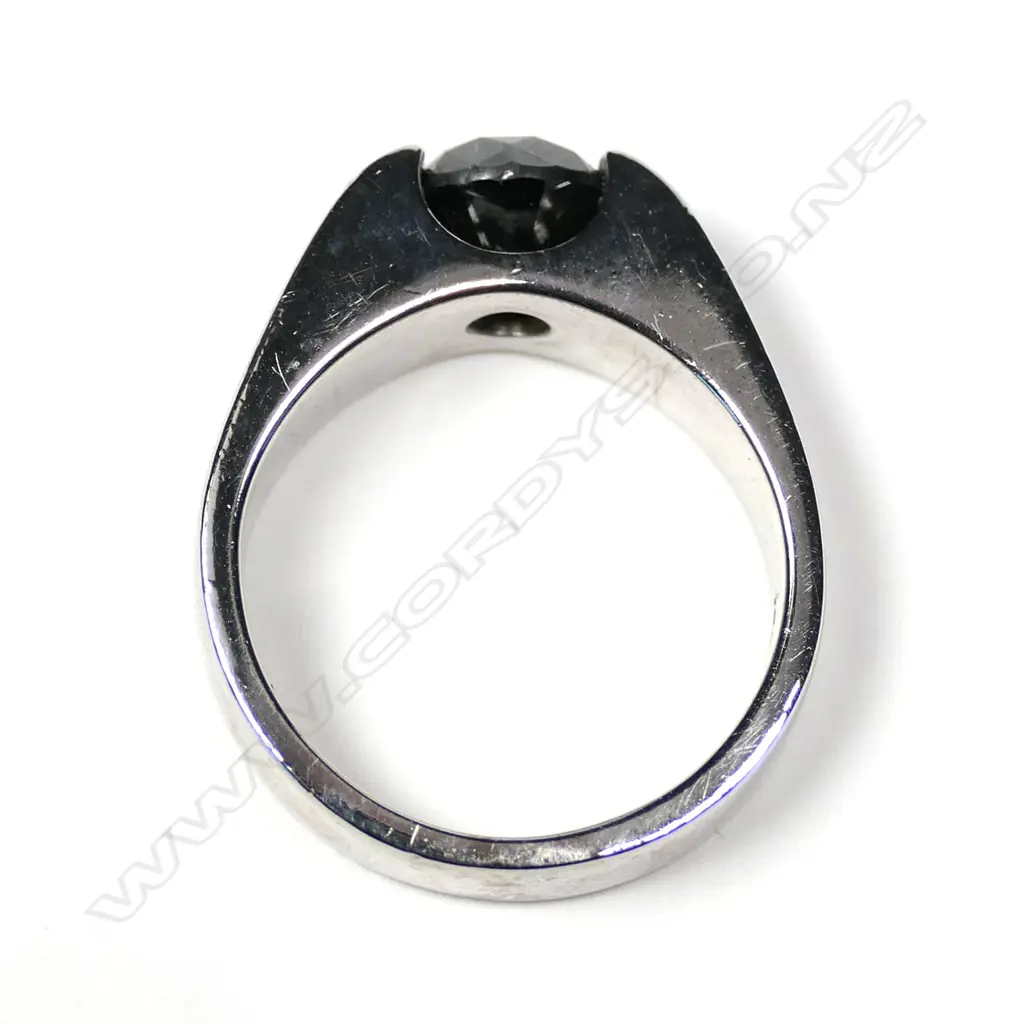 An 18ct white gold black diamond solitaire ring Image 1++