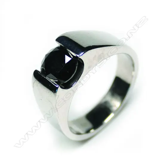 An 18ct white gold black diamond solitaire ring