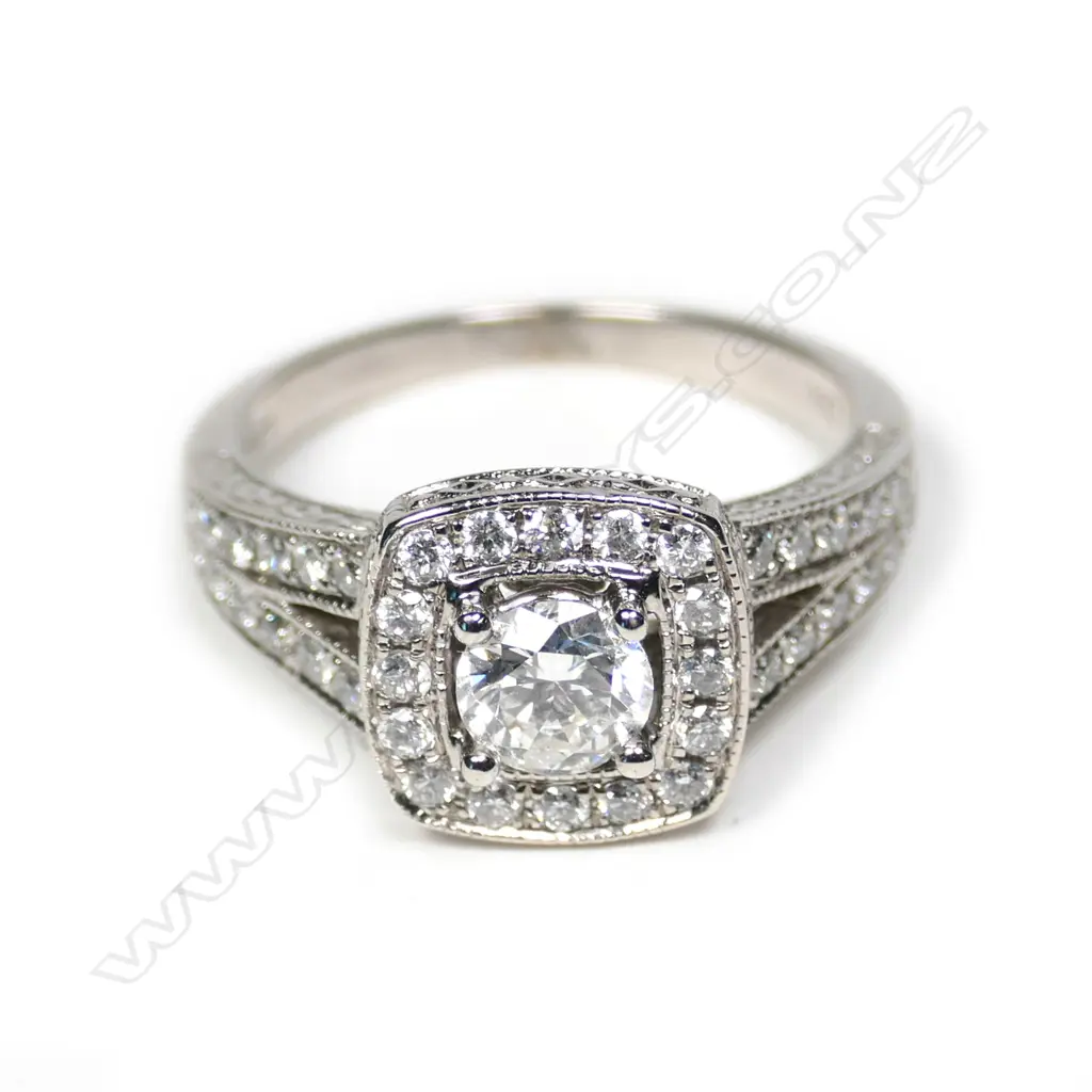 A 14ct white gold multi diamond dress ring Image 1++