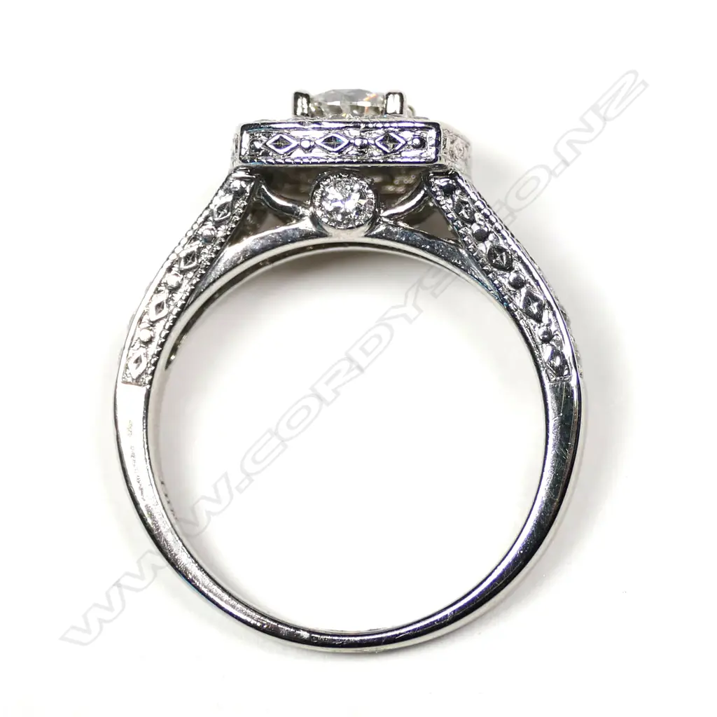 A 14ct white gold multi diamond dress ring Image 1++