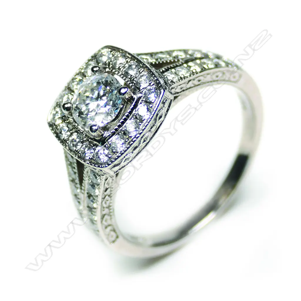 A 14ct white gold multi diamond dress ring Image 1++