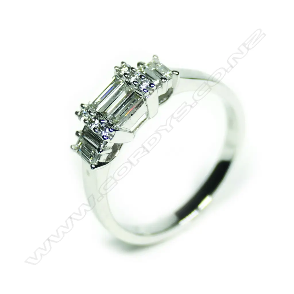 An 18ct white gold and 13 diamond ring Image 1++
