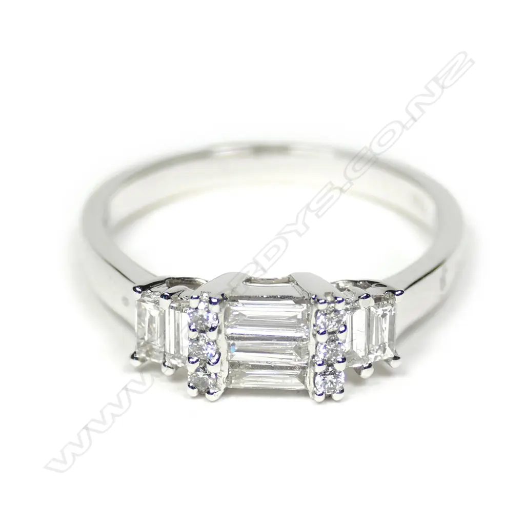 An 18ct white gold and 13 diamond ring Image 1++
