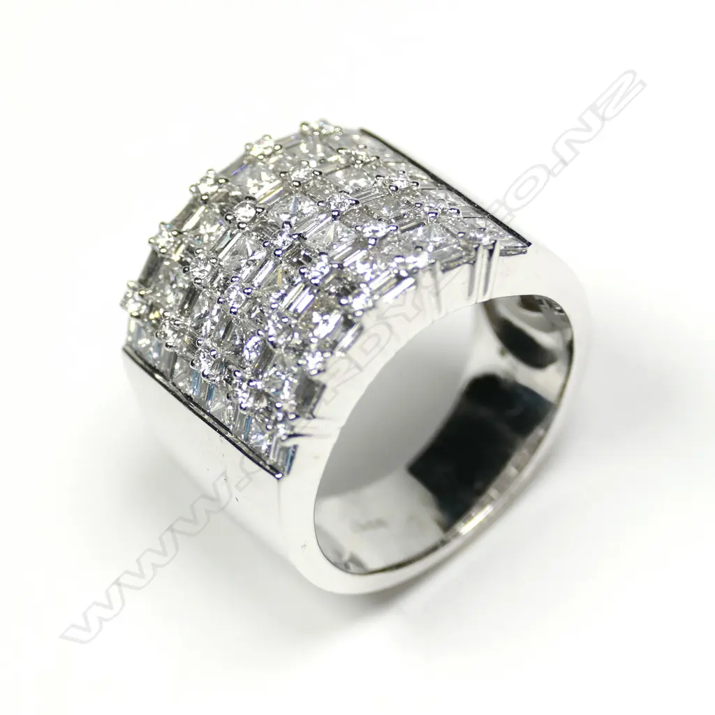 A large 18ct white gold 99 diamond ring Image 1++